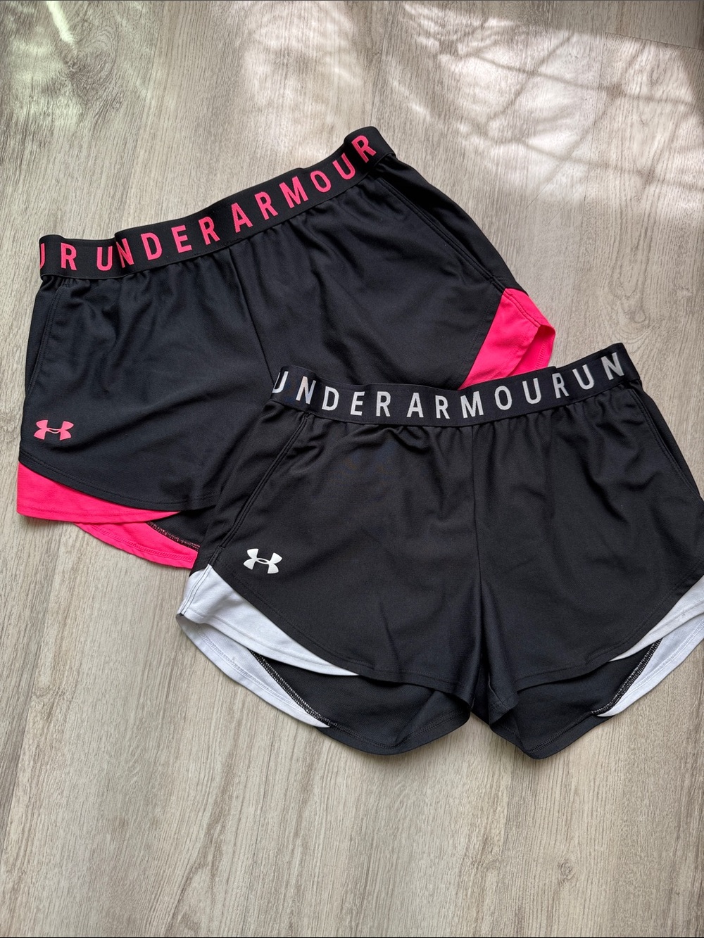 Under Armour Women’s Black Shorts with Pink & White Accents with pockets